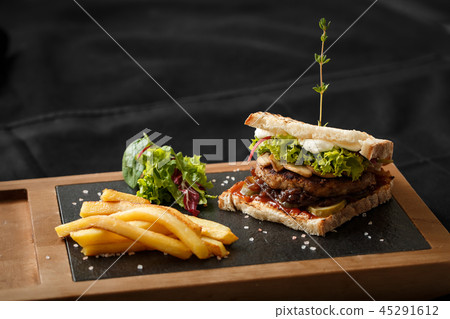 Top view of toast with fried bacon and potatoes 45291612