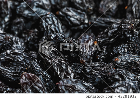 Black Raisin texture, popular dried fruit. Dried  45291932