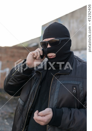 a bandit talking on the phone a bandit talking on the phone 45292406