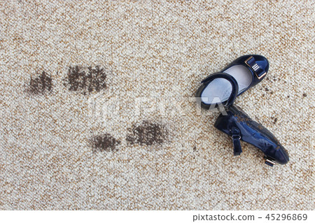 Dirty floor and children's shoes. 45296869