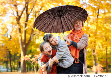 Happy family is in autumn city park. 45298548