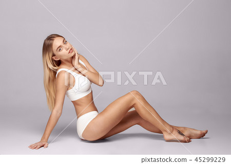 Perfect slim toned young body of the girl . 45299229