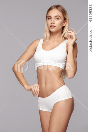 Perfect slim toned young body of the girl . Perfect slim toned young body of the girl . 45299528