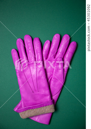 pink gloves on green pink gloves on green 45301092