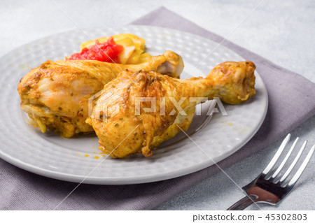 Baked chicken leg Shin with vegetables tomato 45302803