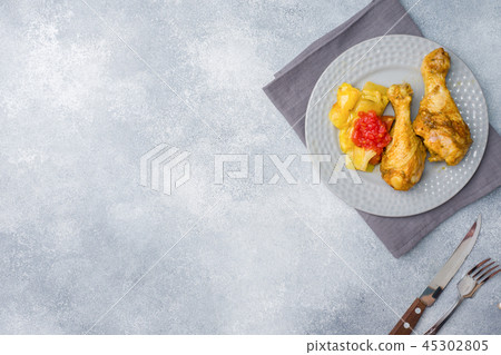 Baked chicken leg Shin with vegetables tomato 45302805