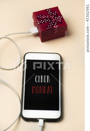 gift and text happy cyber monday in a smartphone gift and text happy cyber monday in a smartphone 45302991