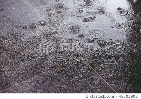 Rain heavy drops in the water Rain heavy drops in the water 45303908