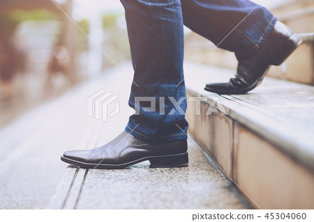 modern business man working close-up legs modern business man working close-up legs 45304060