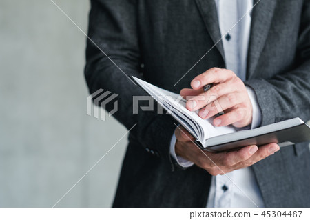 man hold notepad agenda schedule business affair man hold notepad agenda schedule business affair 45304487