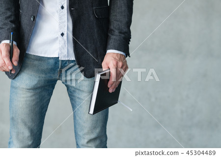 man hold notebook pen business plan strategy man hold notebook pen business plan strategy 45304489