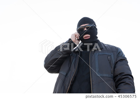 a bandit talking on the phone 45306575