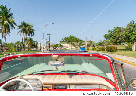Cityscape view inside an old vintage american car 45306910