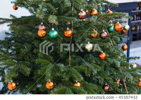 Beautiful colourful decorated christmas tree. Holiday background 45307432