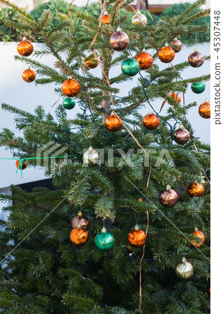 Beautiful colourful decorated christmas tree. Holiday background Beautiful colourful decorated christmas tree. Holiday background 45307448