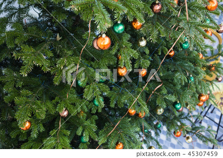 Beautiful colourful decorated christmas tree. Holiday background Beautiful colourful decorated christmas tree. Holiday background 45307459