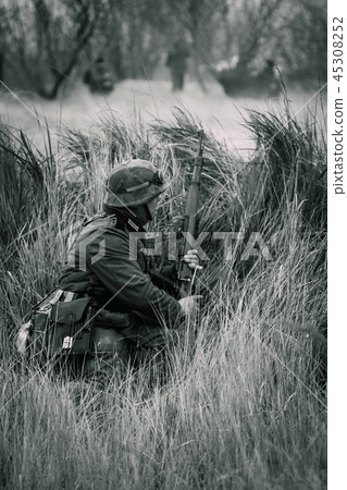 Wehrmacht soldier Germany with a rifle in ambush 45308252
