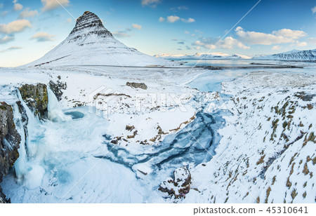 Famous Kirkjufell mountain in winter, Iceland Famous Kirkjufell mountain in winter, Iceland 45310641