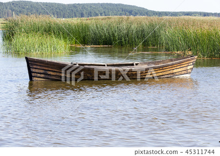 floating wooden boat floating wooden boat 45311744