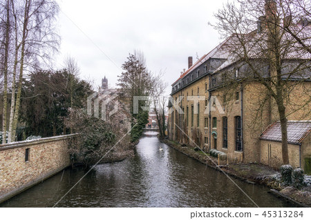 Snowing in Bruges canal 45313284