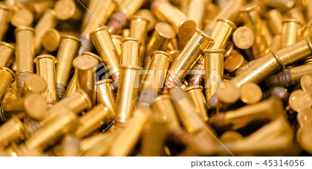 Cylindrical golden bullets in a pile Cylindrical golden bullets in a pile 45314056