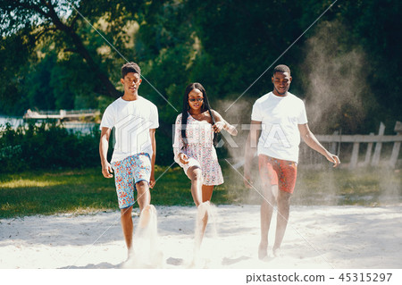 Friends in a summer park 45315297