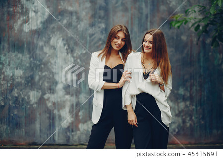 Fashion girls in a city Fashion girls in a city 45315691