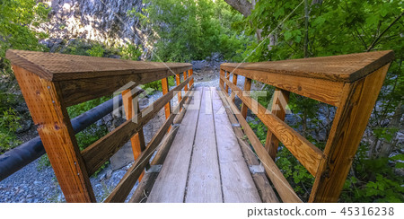 Bridge with rails on a rocky terrain in Provo Bridge with rails on a rocky terrain in Provo 45316238