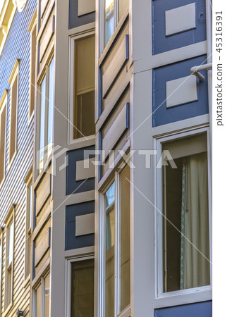 Apartment facade with modern colors and deco Apartment facade with modern colors and deco 45316391