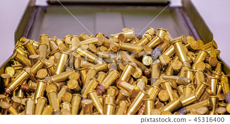 Ammunition box filled with golden bullets Ammunition box filled with golden bullets 45316400