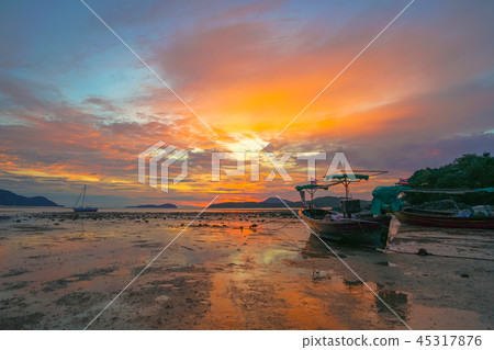 scenery reflection of sunrise on the beach 45317876