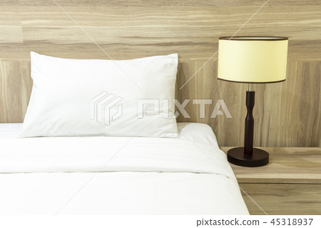 White pillows on a bed. 45318937