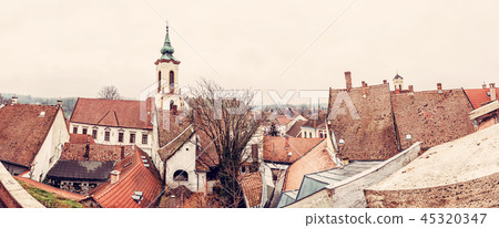 Annunciation church and red roofs of old houses Annunciation church and red roofs of old houses 45320347