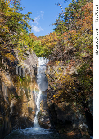 Autumn Shosenkyo Senkyo waterfall Autumn leaves and rainbow and blue sky 45330218