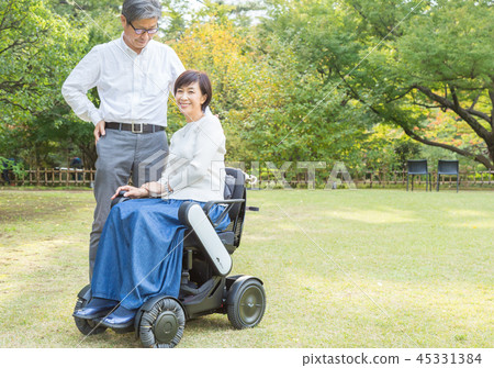 Senior couple care latest electric wheelchair 45331384