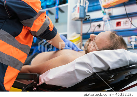 Emergency doctor resuscitate a patient 45332183