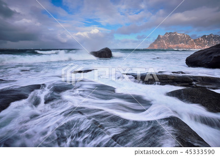 Rocky coast of fjord in Norway 45333590