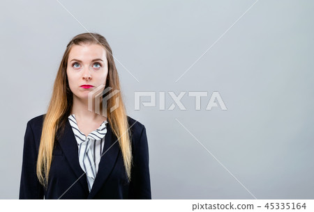 Young woman looking upwards 45335164