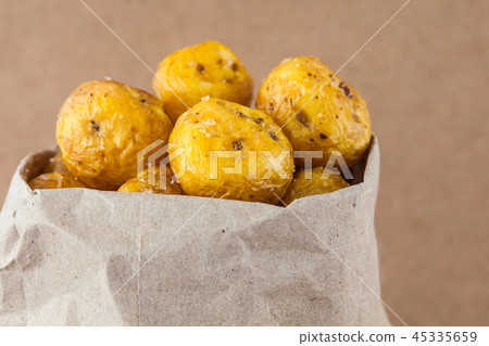 Fried yellow potatoes isolated 45335659