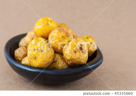 Fried yellow potatoes isolated Fried yellow potatoes isolated 45335660