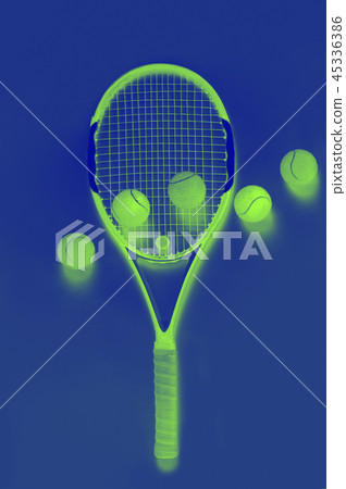 Closeup on ball on a tennis racket 45336386