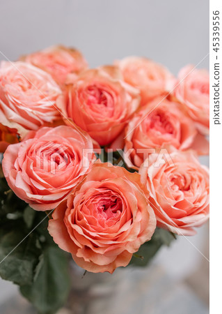 Roses pink pastel colors. Bright bouquet in metal bucket. concept of flower shop. Roses pink pastel colors. Bright bouquet in metal bucket. concept of flower shop. 45339556