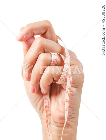 Woman hand holding measuring tape isolated. 45339826