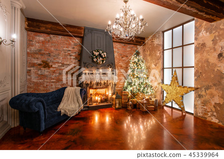 Winter home decor. Christmas in loft interior against brick wall. gifts under the tree Winter home decor. Christmas in loft interior against brick wall. gifts under the tree 45339964