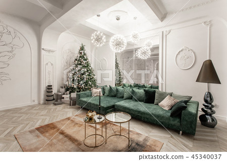 Christmas evening. classic luxurious apartments with decorated christmas tree. Living hall large Christmas evening. classic luxurious apartments with decorated christmas tree. Living hall large 45340037