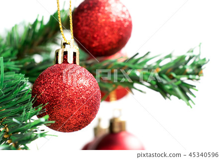 Red decoration ball on green christmas tree Red decoration ball on green christmas tree 45340596