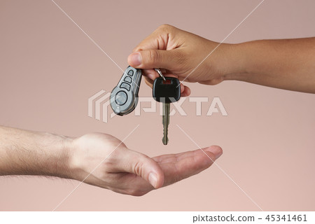 Giving car keys Giving car keys 45341461