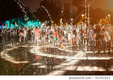 Water fountain splashes at night Water fountain splashes at night 45341825