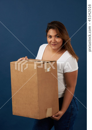 Young girl with cardboard box Young girl with cardboard box 45342016