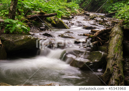 The mountain river flows 45343968